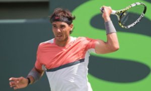 Rafael Nadal won the Mutua Madrid Open for a fourth time after holding off a strong challenge from Kei Nishikori