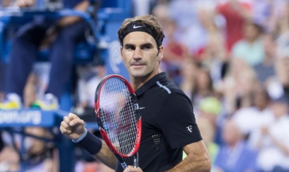 Roger Federer produced a few moments of magic for a US Open crowd that included his sporting hero and basketball legend Michael Jordan en route to a routine first-round win over Marinko Matosevic.