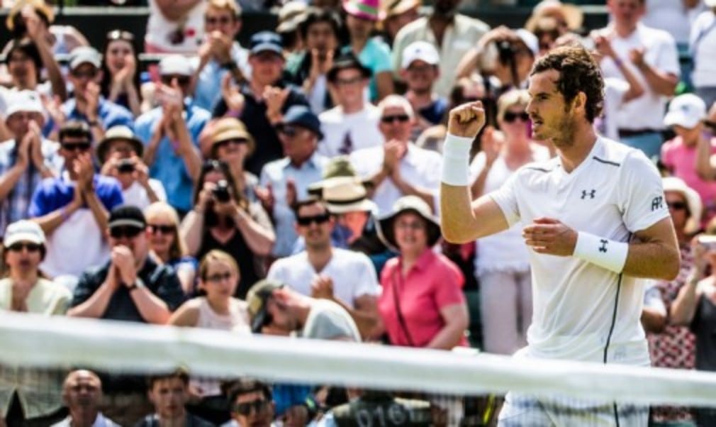 Andy Murray reached an eighth consecutive Wimbledon quarter-final after getting the better of big-serving Croatian Ivo Karlovic