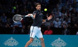 Novak Djokovic needed three sets to beat Dominic Thiem in his opening match at the Barclays ATP World Tour Finals in London on Sunday