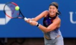Petra Kvitova was the first woman to book her place in the fourth round of the US Open when she defeated Caroline Garcia for the loss of only four games