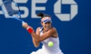 Garbine Muguruza set up a mouth-watering fourth round clash with Petra Kvitova at the US Open after recording an emphatic 6-1 6-1 victory over Magdalena Rybarikova in 61 minutes