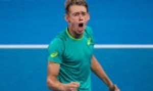 Alex De Minaur announced his arrival on the world stage by inflicting a surprise 6-4 6-4 defeat on Milos Raonic at the second round stage of the Brisbane International