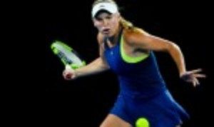Caroline Wozniacki sailed into the third round of the Qatar Open after an emphatic 6-2 6-0 win over Carina Witthoeft in just 57 minutes