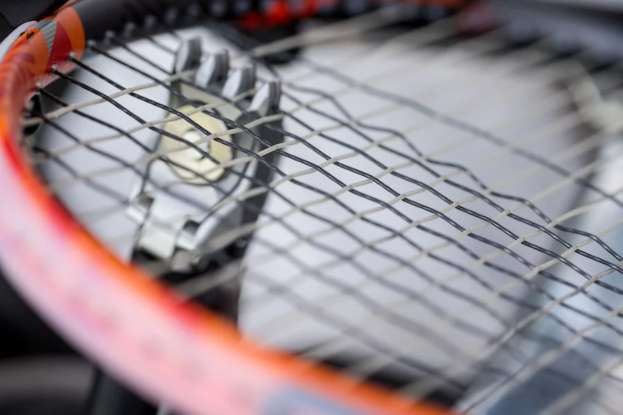 tennis racquet ball on string