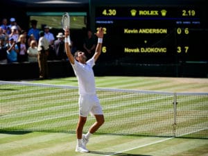 Novak Djokovic celebrates after winning Wimbledon 2018