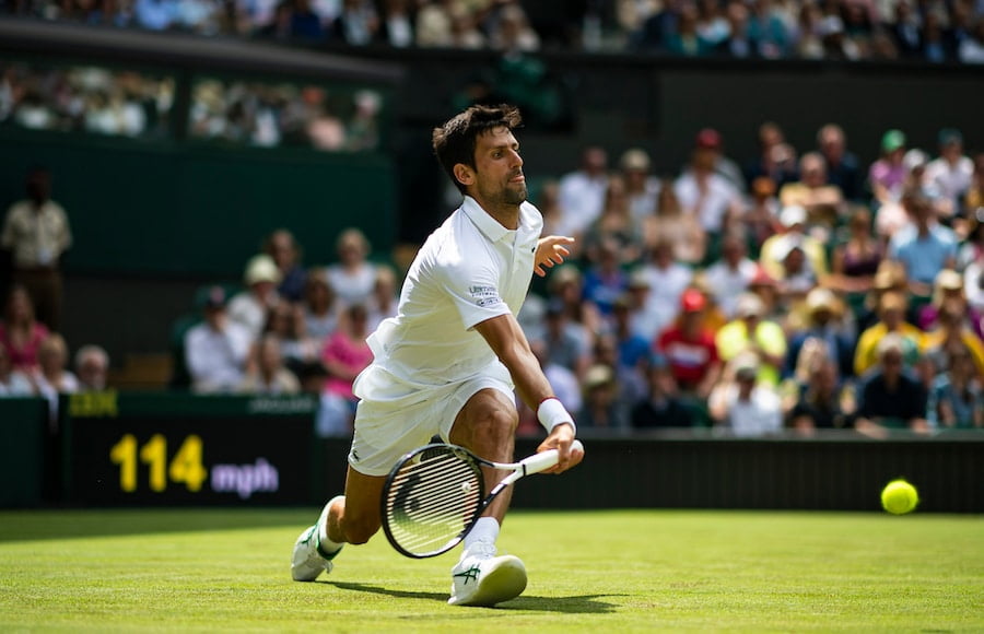 Novak Djokovic stretches to reach at Wimbledon 2019