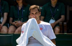 Roger Federer relaxes at Wimbledon 2019