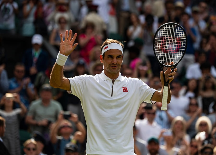 Roger Federer celebrates at Wimbledon