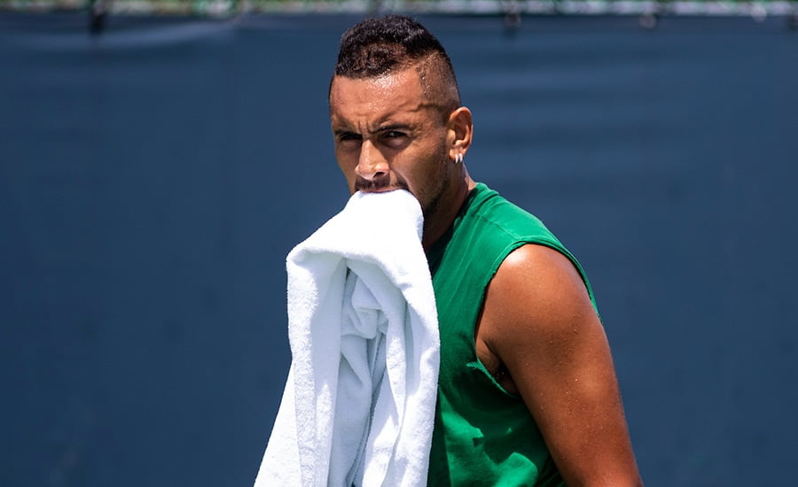 Nick Kyrgios looking on