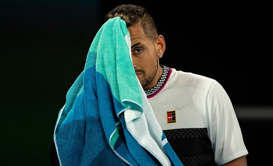 Nick Kyrgios looking distressed