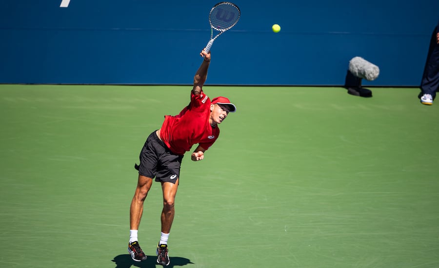 Alex de Minaur serves at US Open 2019