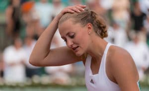 Kristina Mladenovic holds head French Open