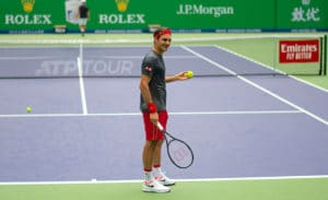 Roger Federer laughs in practise at Shanghai 2019
