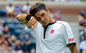 Roger Federer wipes brow at US Open 2019