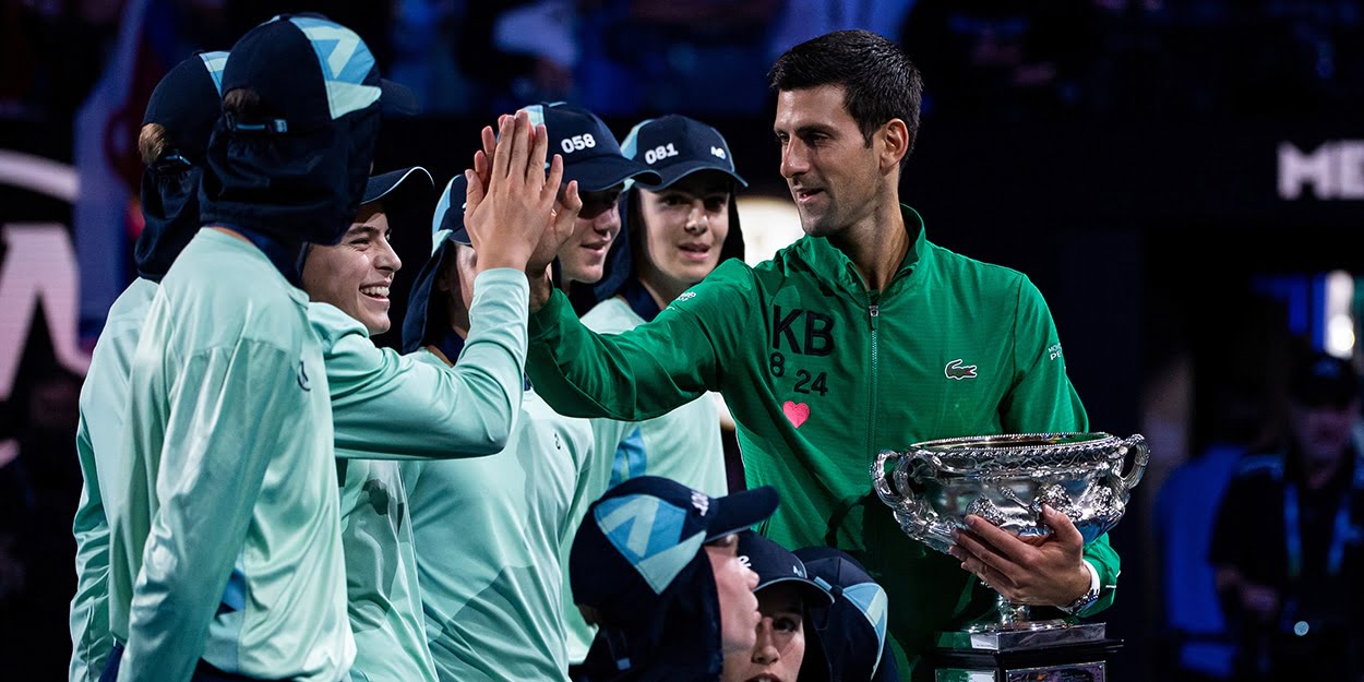 Novak Djokovic celebrates Australian Open win