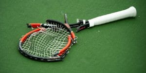 smashed tennis racket