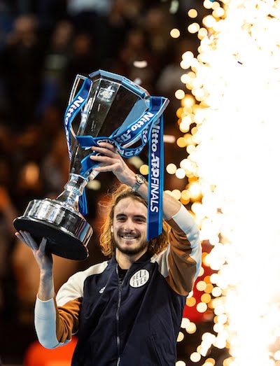 Stefanos Tsitsipas holds ATP Finals trophy.jpg