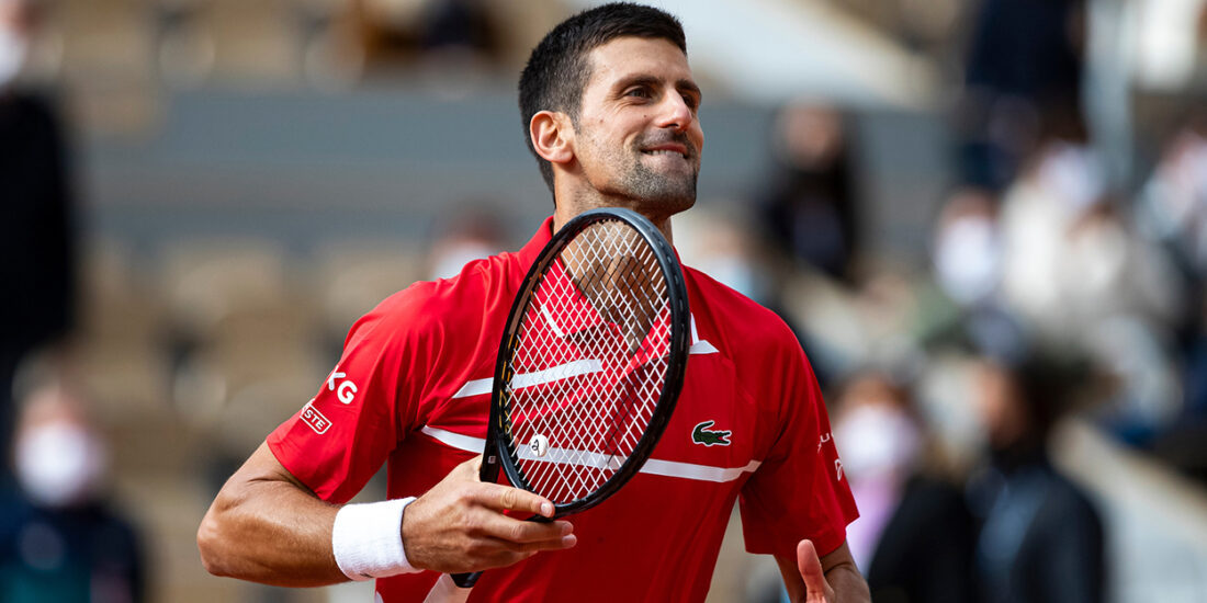 Novak Djokovic celebrates at Roland Garros