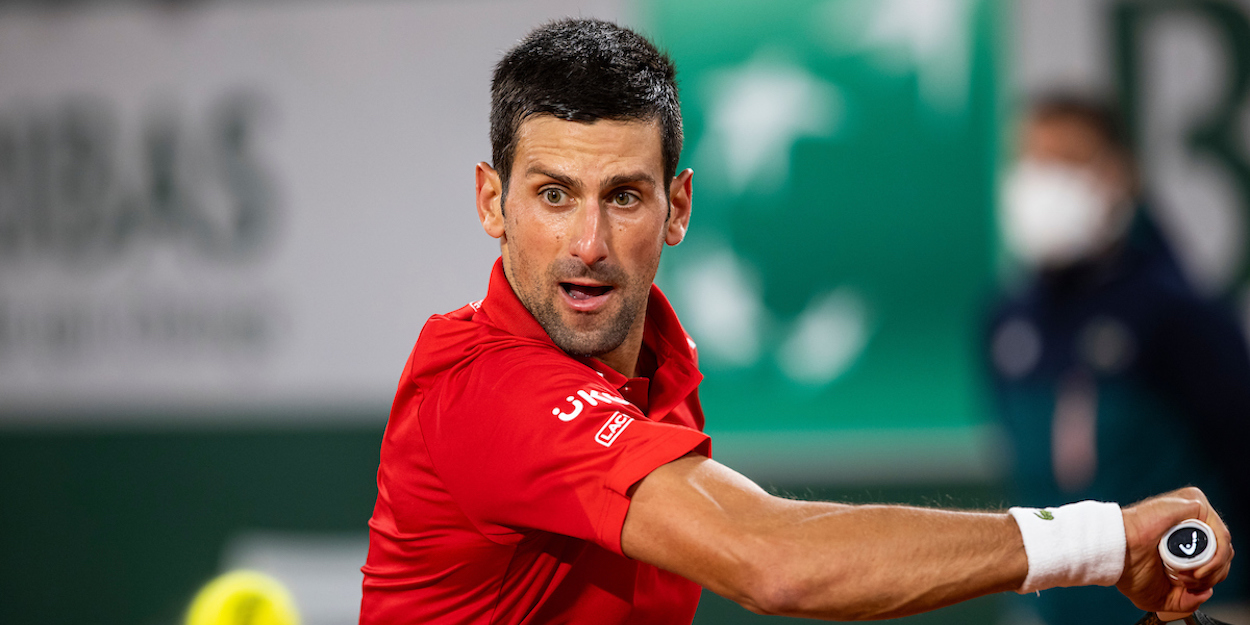 Novak Djokovic concentrates on a backhand at French Open 2020