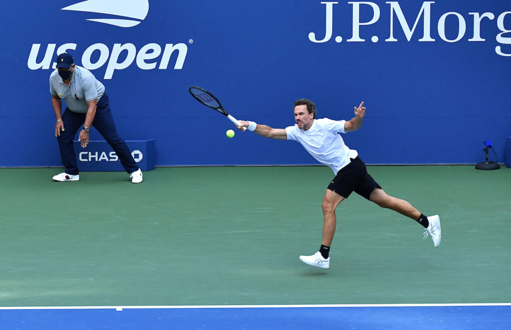 Bruno Soares stretches for a froehand return at the 2020 US Open