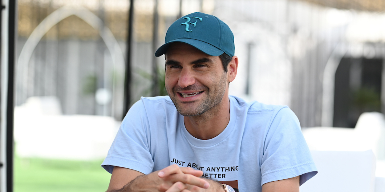 ROGER FEDERER smiles during interview