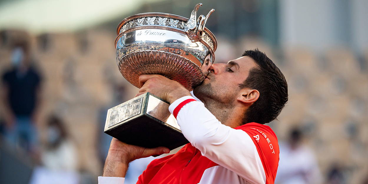 Novak Djokovic kissing French Open trophy