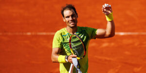 Rafael Nadal salutes the crowd after beating Novak Djokovic