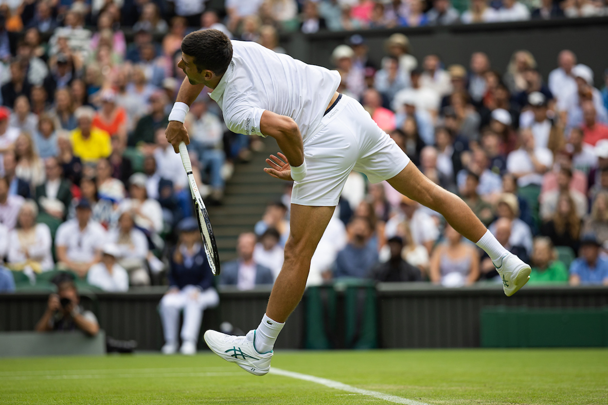 Novak Djokovic serves at Wimbledon 2023